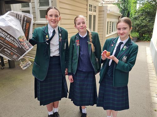 Charlotte, Samantha and Gracie celebrate Jerry's successful landing.