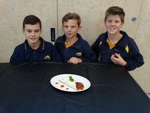 Zac, Jaxson, and Noah with their apricot chicken fajita. A real party in the mouth!