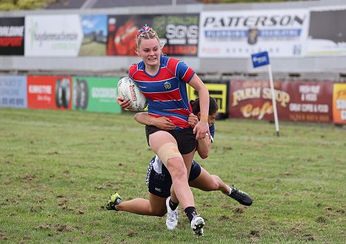 Neave Rowland heading to the try line.