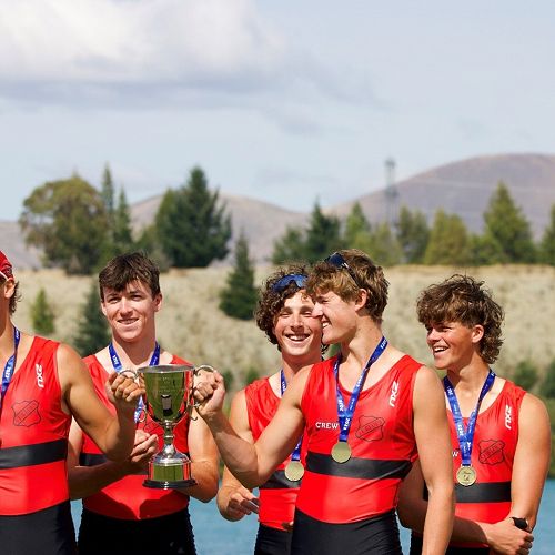 Champions: Matthew Glen, left, and Sam Woodgate hold the Maadi Cup with the winning team from St Bede's.