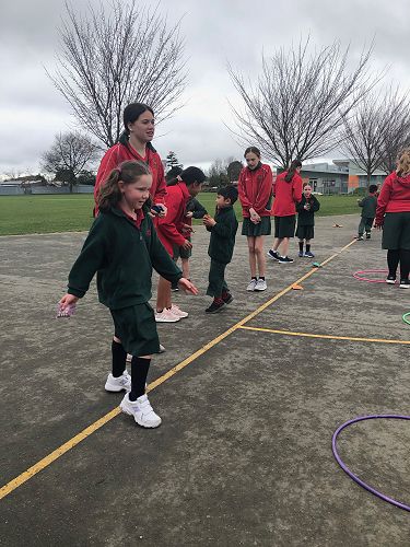 With her buddy, Tilly practised her skills from Fitness.
