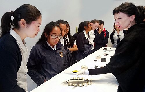 Angela Yu and Paula Suyam talking with Caroline Billing from the National Gallery.