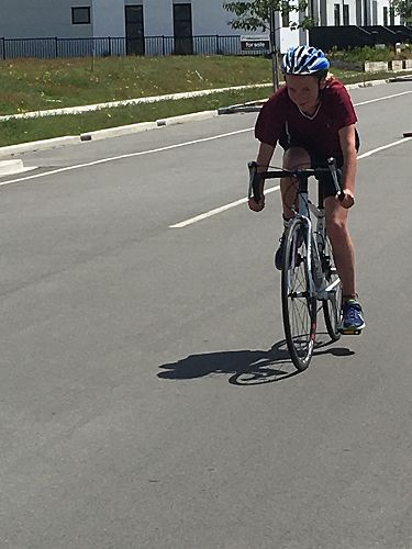 Lydia, biking and managing to smile!! 