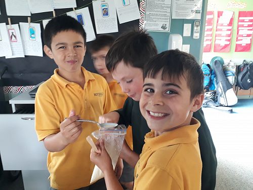 Year 5 / 6 students tasting their ice cream.