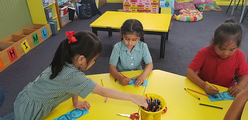 Making our first day at school medals