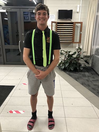 Year 12 Prefect, Johno O'Brien, looking the part with his fluoro braces and matching tie!