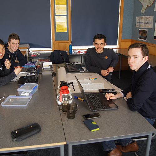 Luke, James, Matthew and Louis work towards a solution
