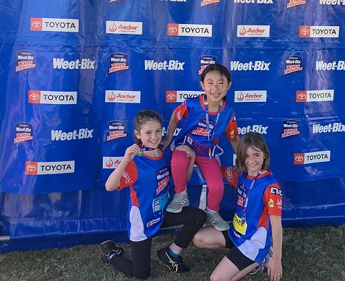 Smiles all round for this group of young athletes!