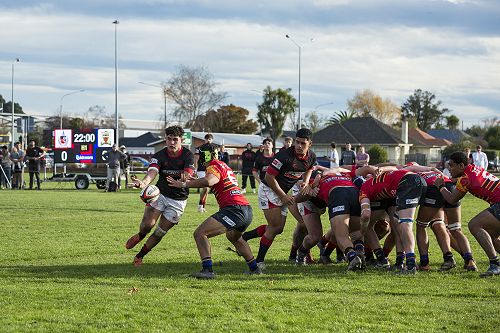 Evasive: Christian Ioane manages to get the pass away to set up opportunities for the backline.