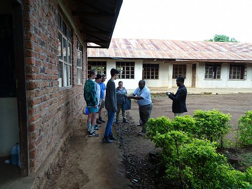 Presenting our gift of a Laptop to the Kisiba High School Principal