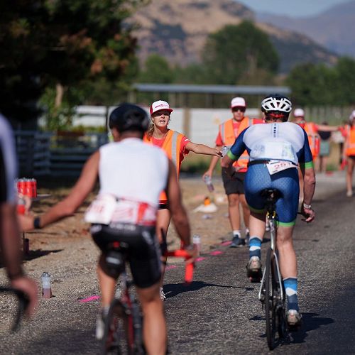 Students in the Community helping at Challenge Wanaka ensuring athletes stay safe and hydrated