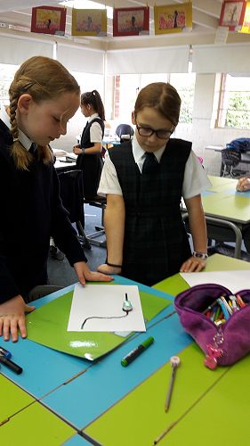 Charlotte and Esmé testing out their Ozobot