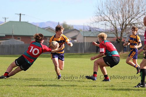 Will Johnson on the burst against Lincoln Combined