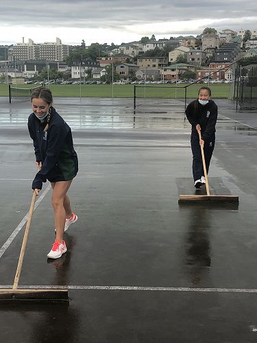 Erin O'Neill and Crystal Chiang enjoying doing their part 