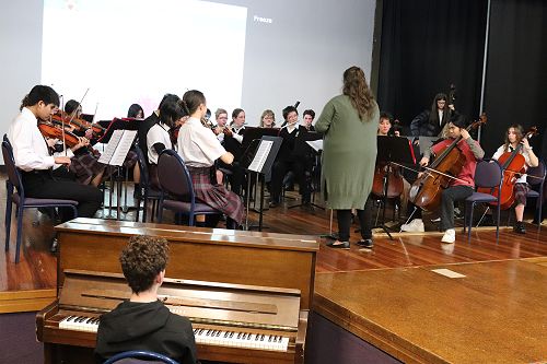 Orchestra Performs at Assembly!