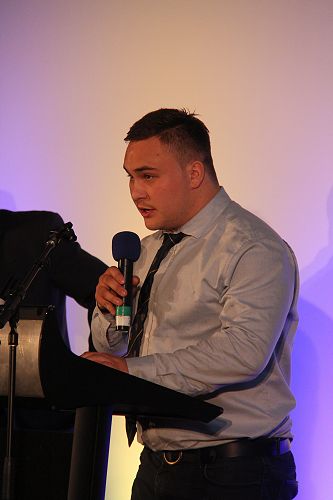 Joel Hintz delivering the evenings Karakia and grace