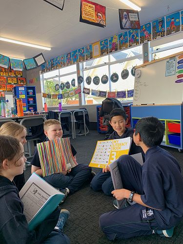 Bilal Ahmad leads Simba Tang, Jamie Copland, Anna Riley and Mia North by asking the discussion questions he has prepared