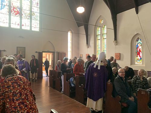 The congregation sharing The Peace