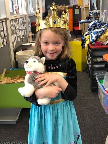 The Princess is in her classroom with her corgi