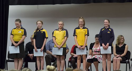 Proud students with their certificates