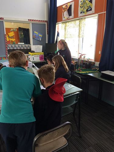 Theo and Mackayla leading a workshop