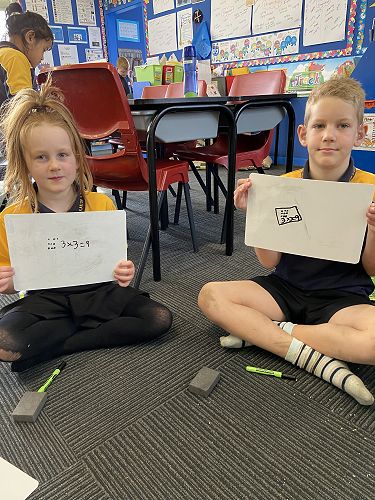 Phoebe and Liam showing 3x3 array