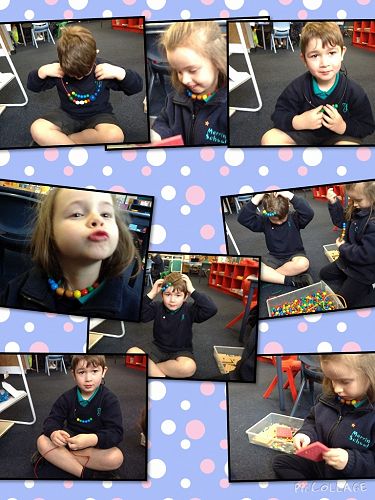 Phoebe and Leon having a great time practicing fine motor skills