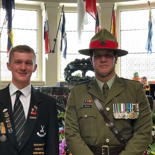 Dylan Woodhouse with Lieutenant Colonel Olly Te Ua in 2018
