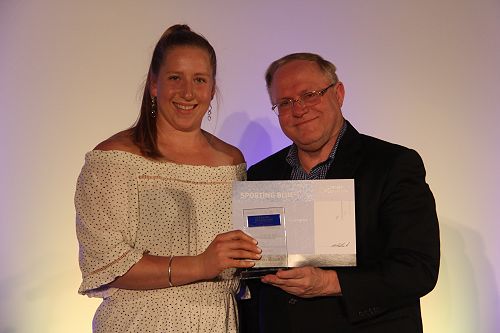 Lauren Bruce receiving her Lincoln University Blue for Athletics from Vice Chancellor Robin Pollard