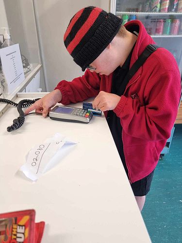 Another new activity for Nicholas.                  Nicholas has an Eftpos card now and is learning to use it. Well done Nicholas.