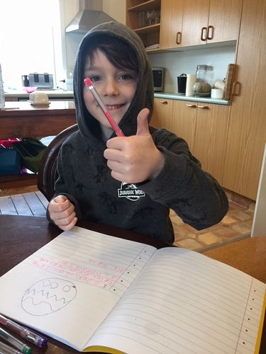 Jett Cook (Year 2) writing a story about Easter and Easter eggs