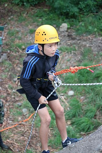 Lucas giving abseiling a go
