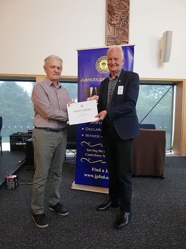 John Swanson receiving his 30 year MOJ Long Service Certificate