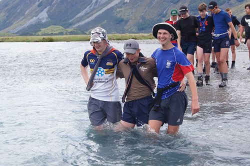 Sam, Andrew and Caleb crossing a braid of the Huxley River