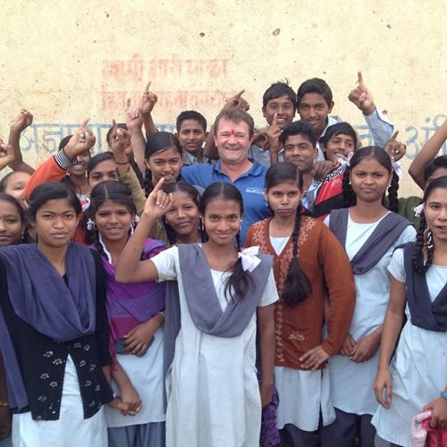 PP Mark Balla in the middle surrounded by students