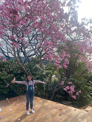 Claudia and her lovely magnolia tree