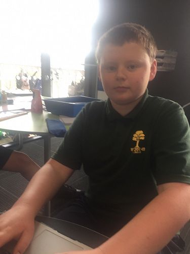 Josh, looking shrewd with his writing. 