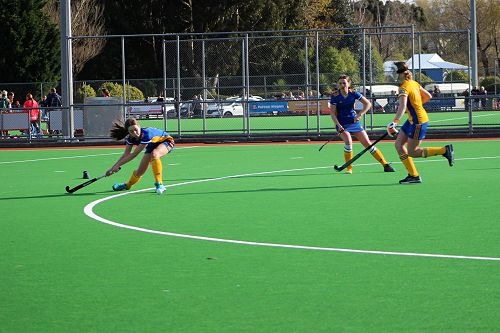 Sopie taking a penalty corner shot