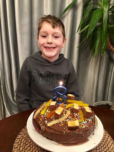 Jett Cook  with his amazing birthday cake