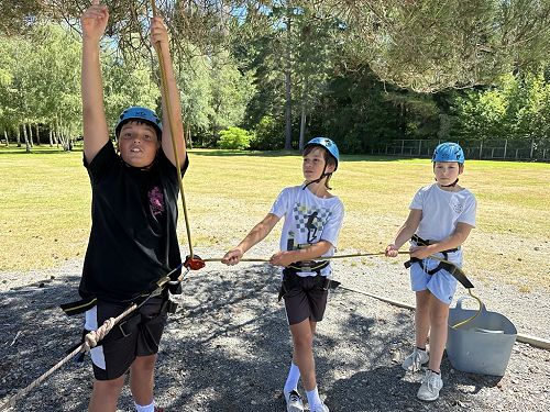 Isaac, Harvey and Xion are tasked with belaying at the tree climbing activity