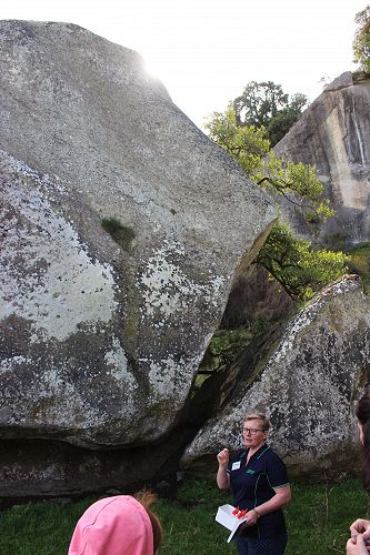 Keely Kroning, from South Canterbury Museum discussing weathering of rocks at Kakahu 