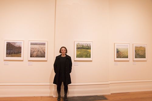 Hannah Joynt with her work at the exhibition New Perspectives on Landscape at the Forrester Gallery, Oamaru