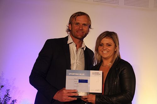 Scott Roberston presents Becky Davidson with her Lincoln University Blue for Touch Rugby