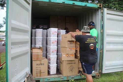 Relief items for Tonga being loaded by Anglican Diocese of Polynesia, Suva, Fiji.