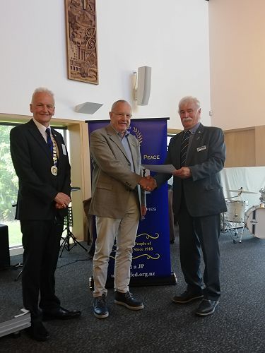 Chris Bell receiving his certificate of service for 40 years of service from Graeme Barber and Southern Regional Rep Lindsay Dow