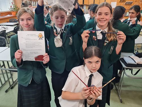 Amelia, Bridget, Heidi and Sophie pose with their craft before launch.