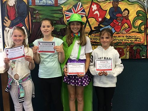 Integrity awards for: Ava, Madison, Jennifer and Casey