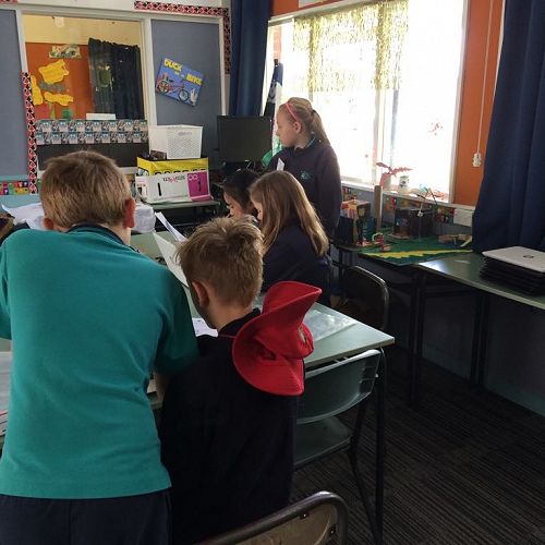 Theo and Mackayla leading a workshop