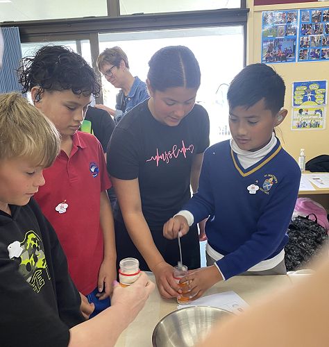 Lachlan, Rawiri, Te Maire and Theus making the yeast