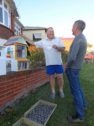 Neighbours Murray Paterson and Barry Arnison check